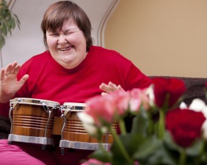 Mentally disabled woman plays drum